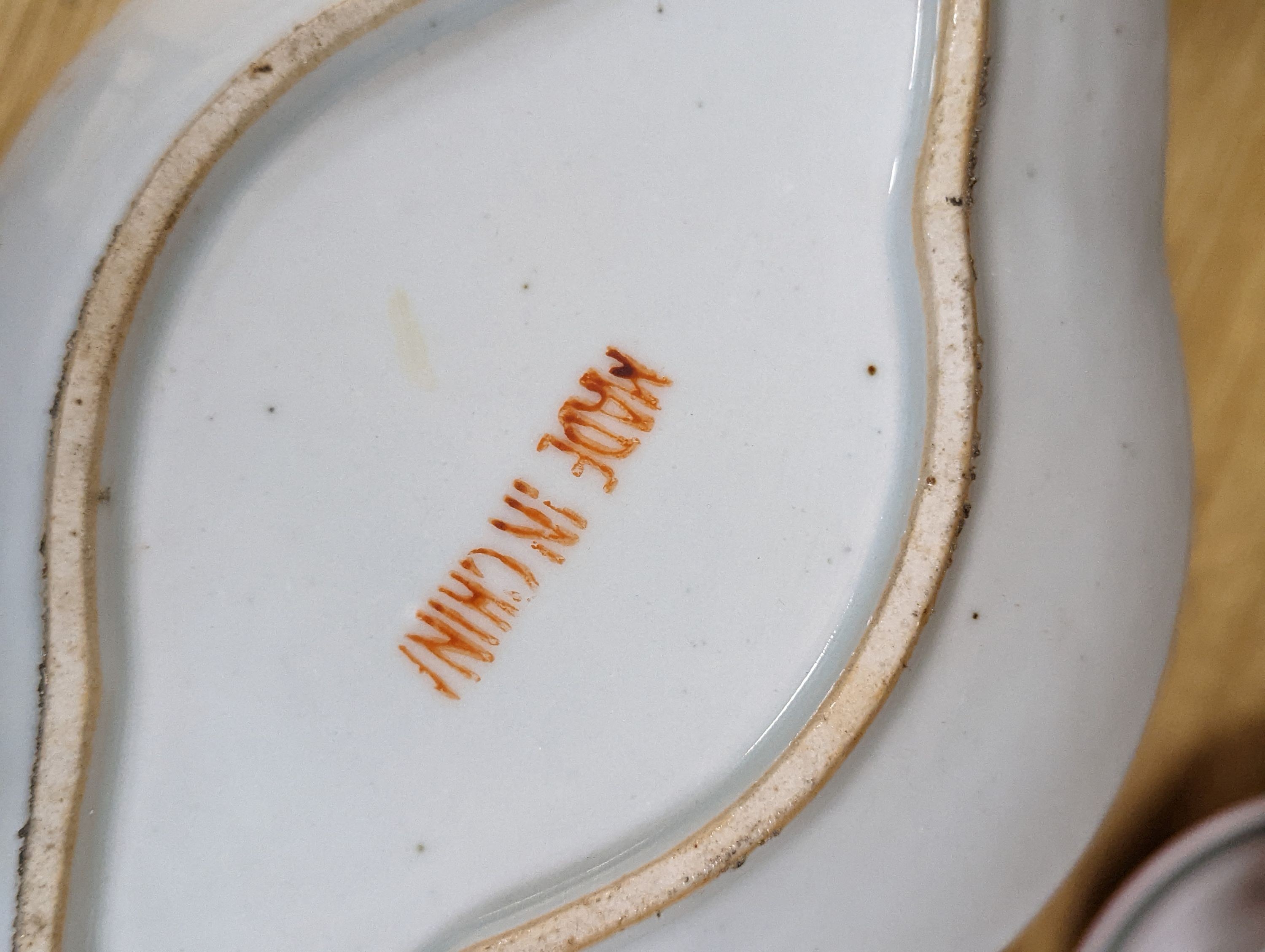 A group of Chinese enamelled porcelain plates, dishes, covers, cups and a vase